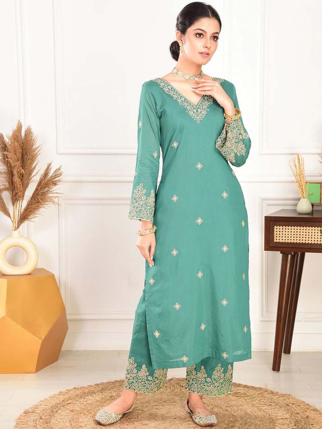 Elegant green embroidered suit with graceful dupatta detailing - Image 4