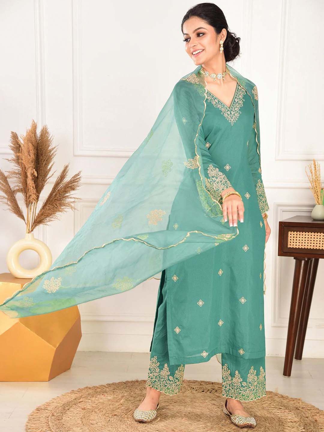 Elegant green embroidered suit with graceful dupatta detailing - Image 5
