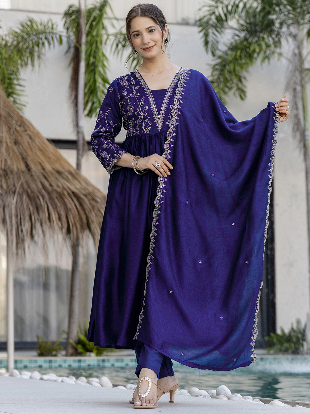 Elegant navy blue kurti set with delicate golden embroidery and a flowy silhouette. - Image 9