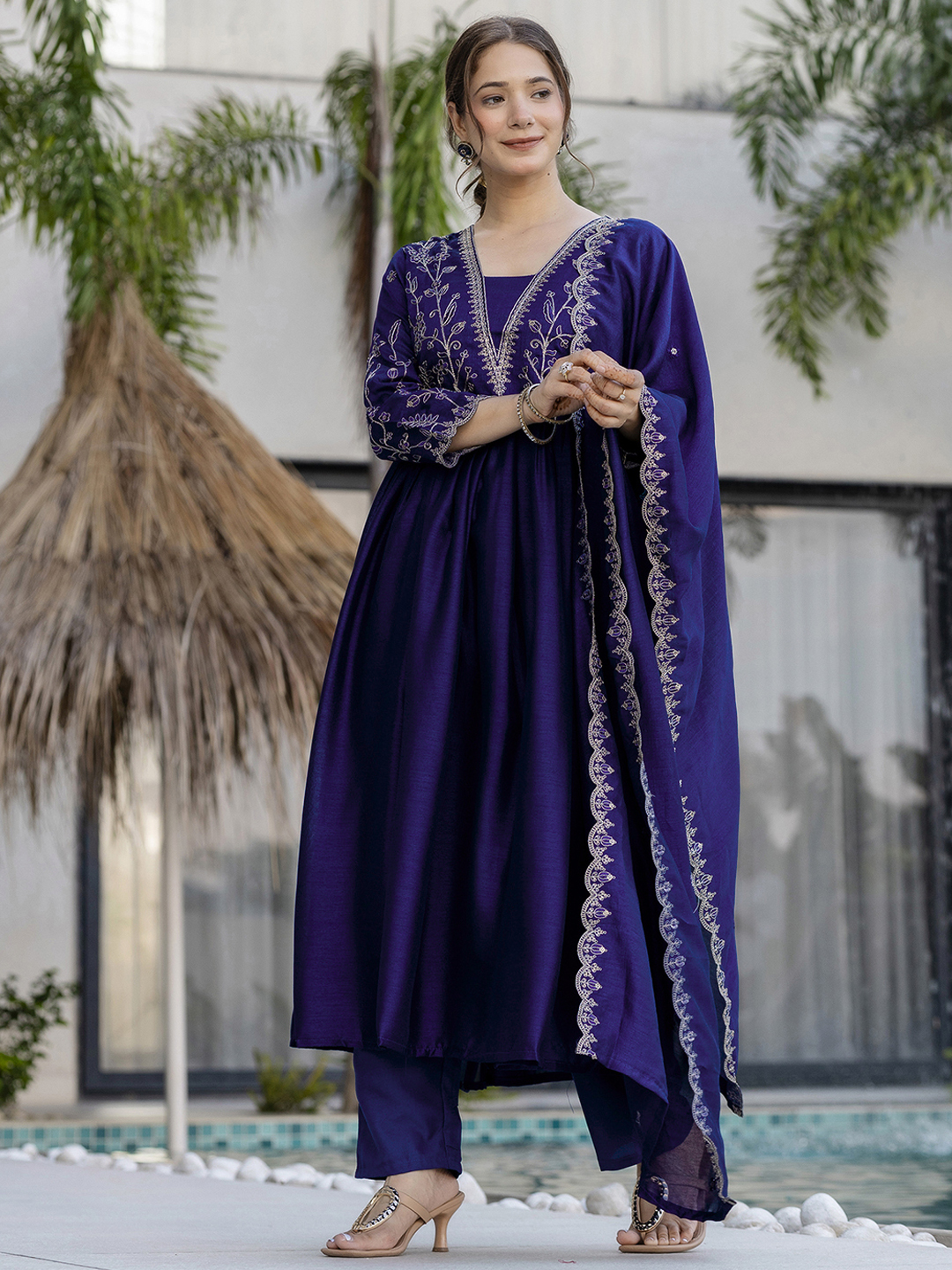 Elegant navy blue kurti set with delicate golden embroidery and a flowy silhouette. - Image 3