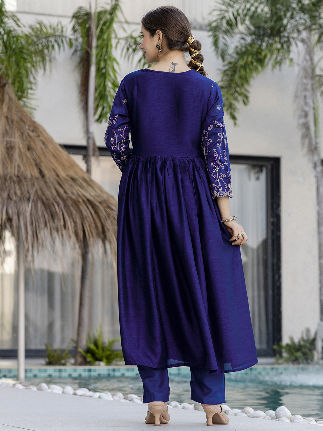 Elegant navy blue kurti set with delicate golden embroidery and a flowy silhouette. - Image 4