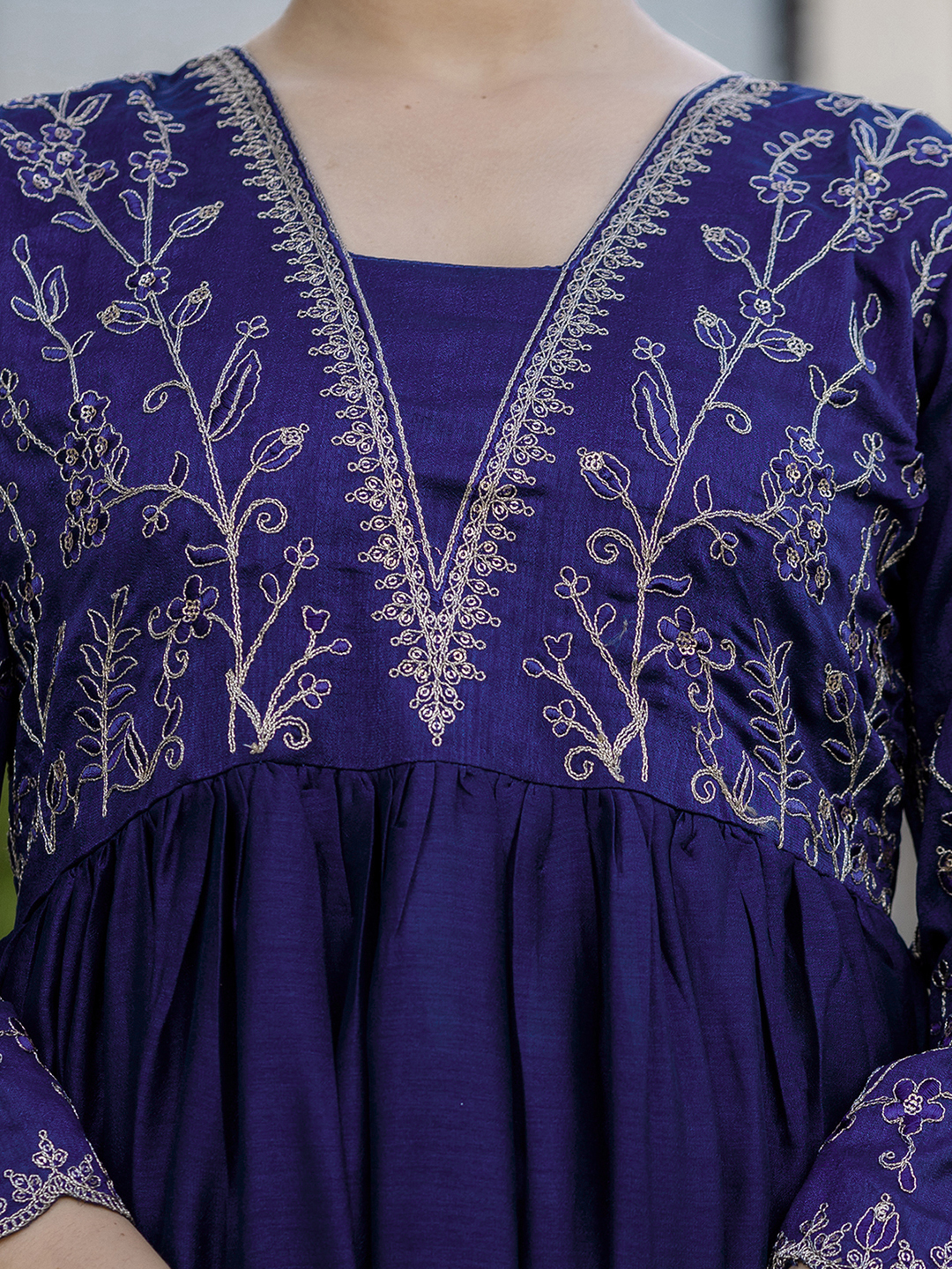 Elegant navy blue kurti set with delicate golden embroidery and a flowy silhouette. - Image 5