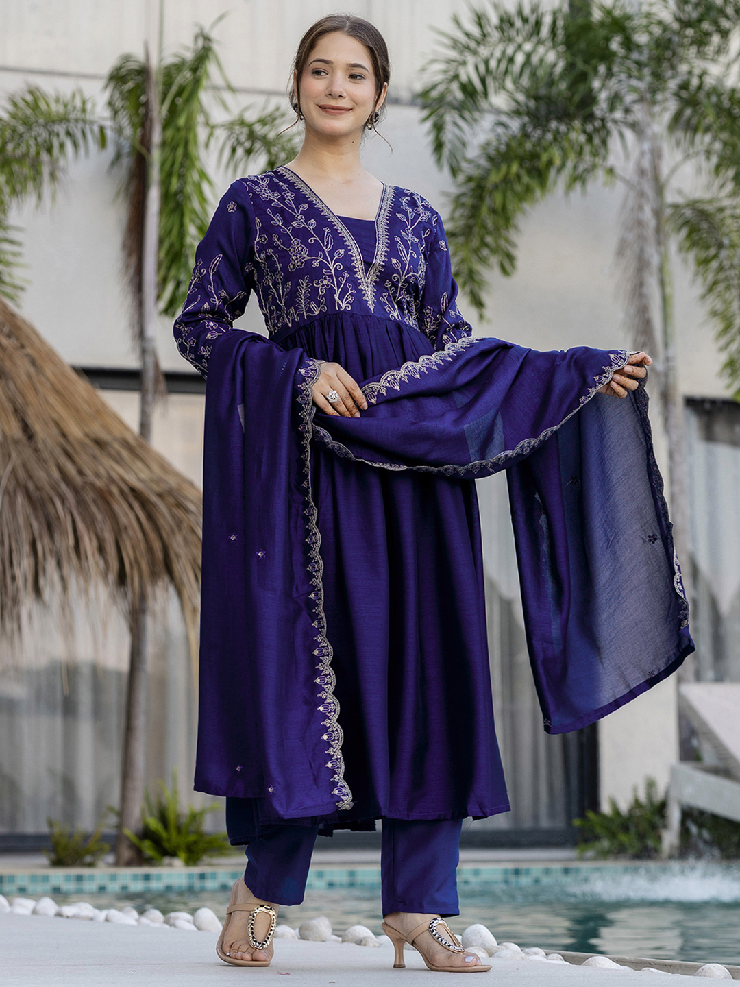 Elegant navy blue kurti set with delicate golden embroidery and a flowy silhouette. - Image 6