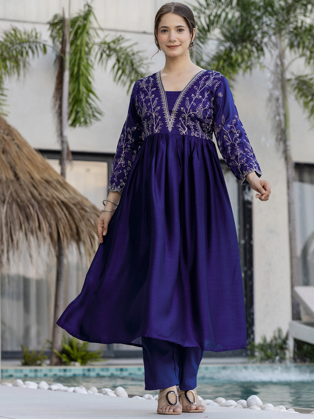 Elegant navy blue kurti set with delicate golden embroidery and a flowy silhouette. - Image 7