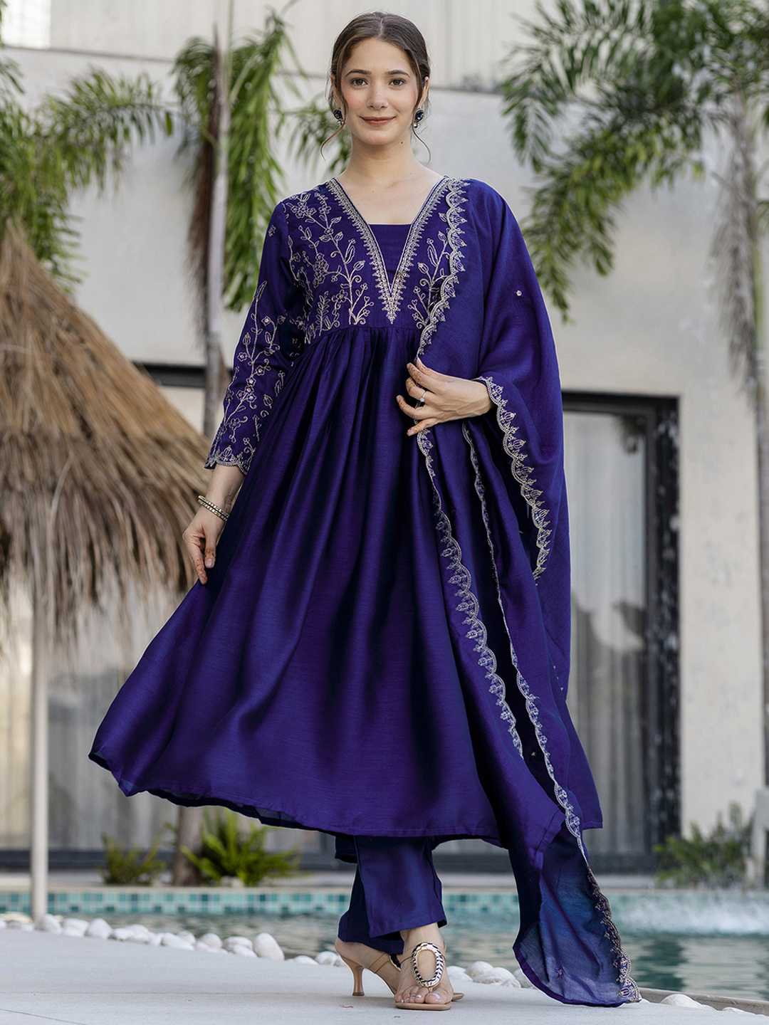 Elegant navy blue kurti set with delicate golden embroidery and a flowy silhouette. - Image 2